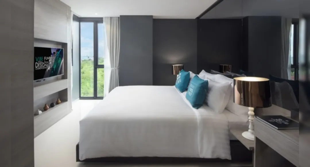 One Bedroom Corner Suite - Bedroom