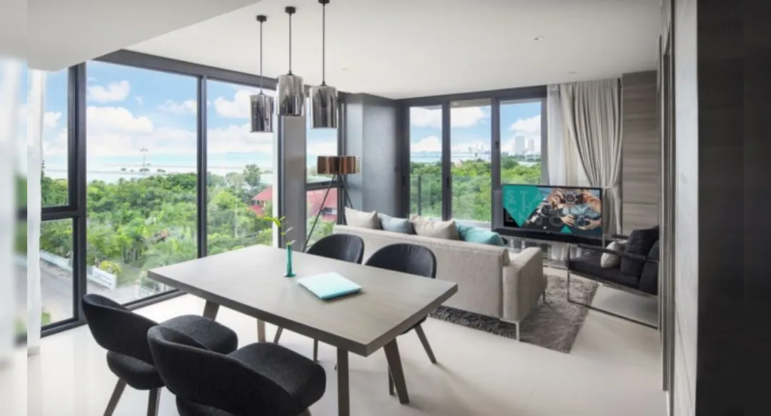 One Bedroom Corner Suite Sea View - Living Room