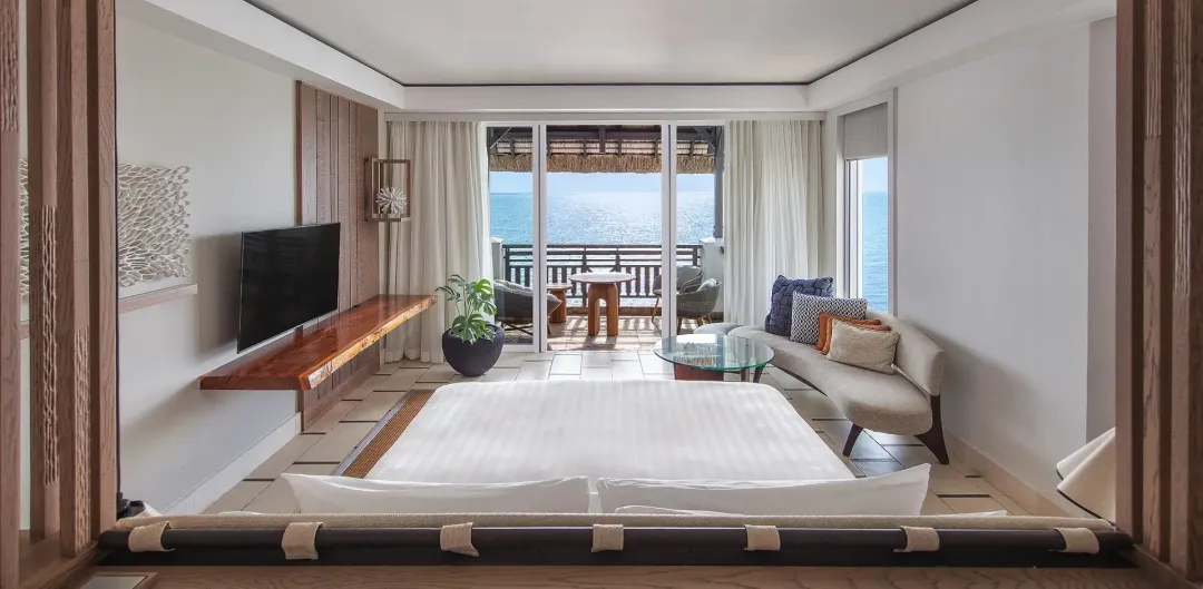 Frangipani Ocean View Junior Suite - Bedroom with Ocean View