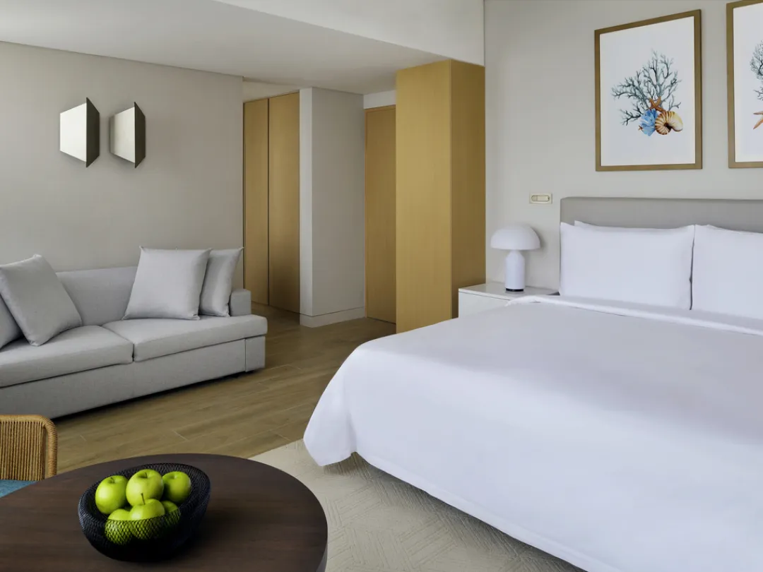 Beachfront Junior Suite with Private Terrace - Bedroom View