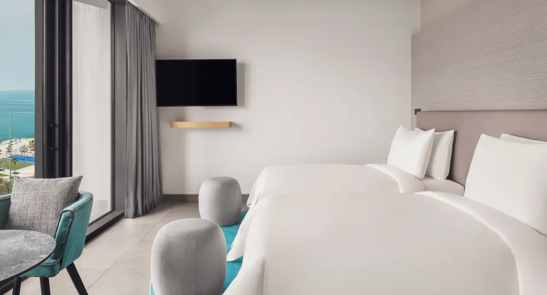 Deluxe Beach and Pool View Room - Twin Bed