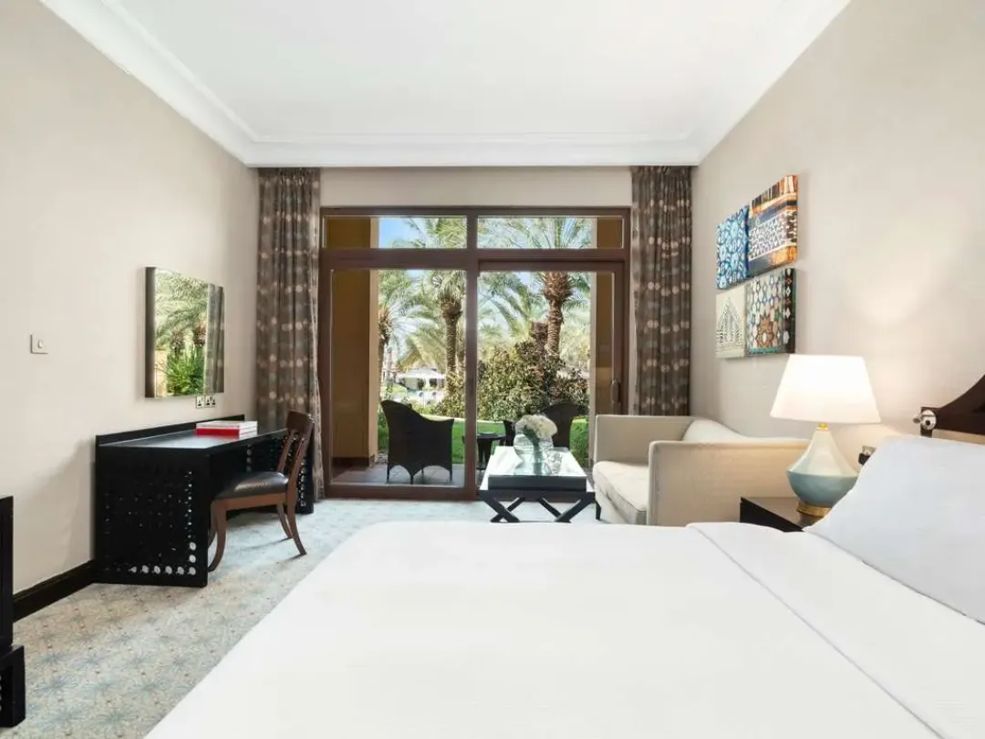 Deluxe Room - Bedroom with Garden View