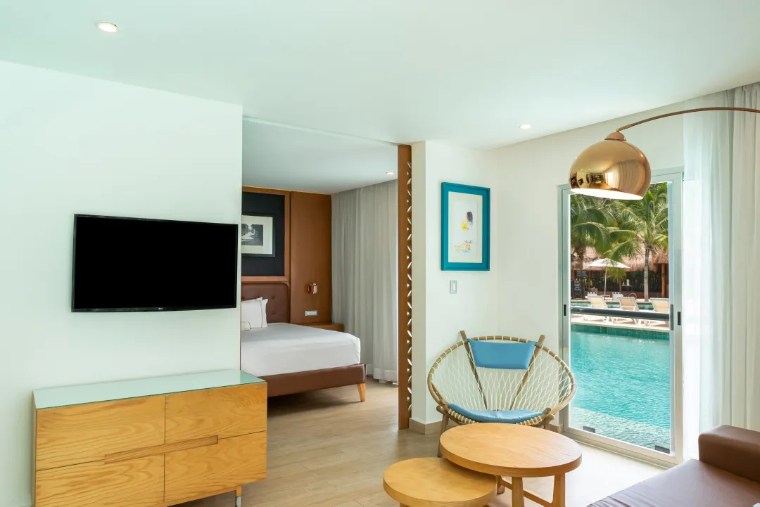 One Bedroom Swim Up Residence - Bedroom with Pool View