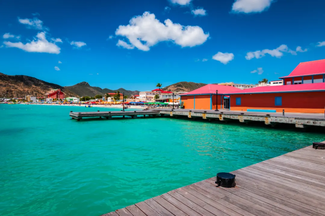Wooden dock and colorful buildings in Philipsburg St Maarten 