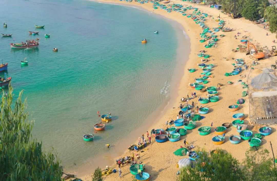 Aerial view of Quy Nhon beach with curved shore line 