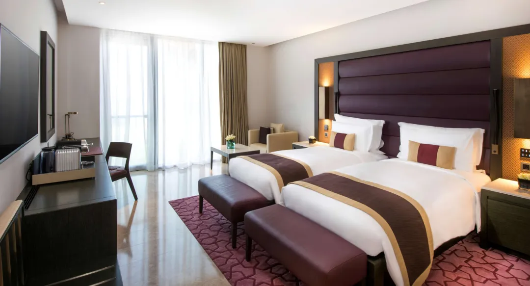Kempinski-Hotel-Muscat-Deluxe-Room-Twin-Beds