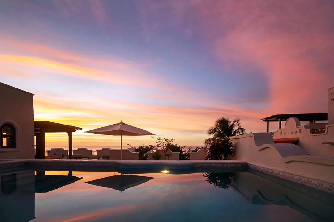 Oceanview Suite with Pool & Roof Terrace -Pool View after Sunset