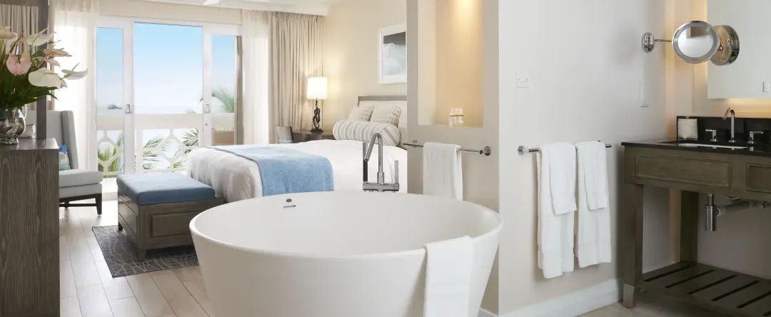 Luxury Grand Oceanfront Room - Bedroom with View