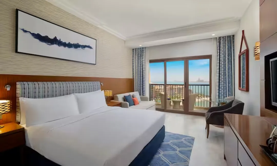 Family Guest Room with Balcony and Sea View - King Bed