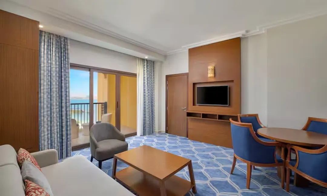 One Bedroom Suite with Balcony - Seating Aeria