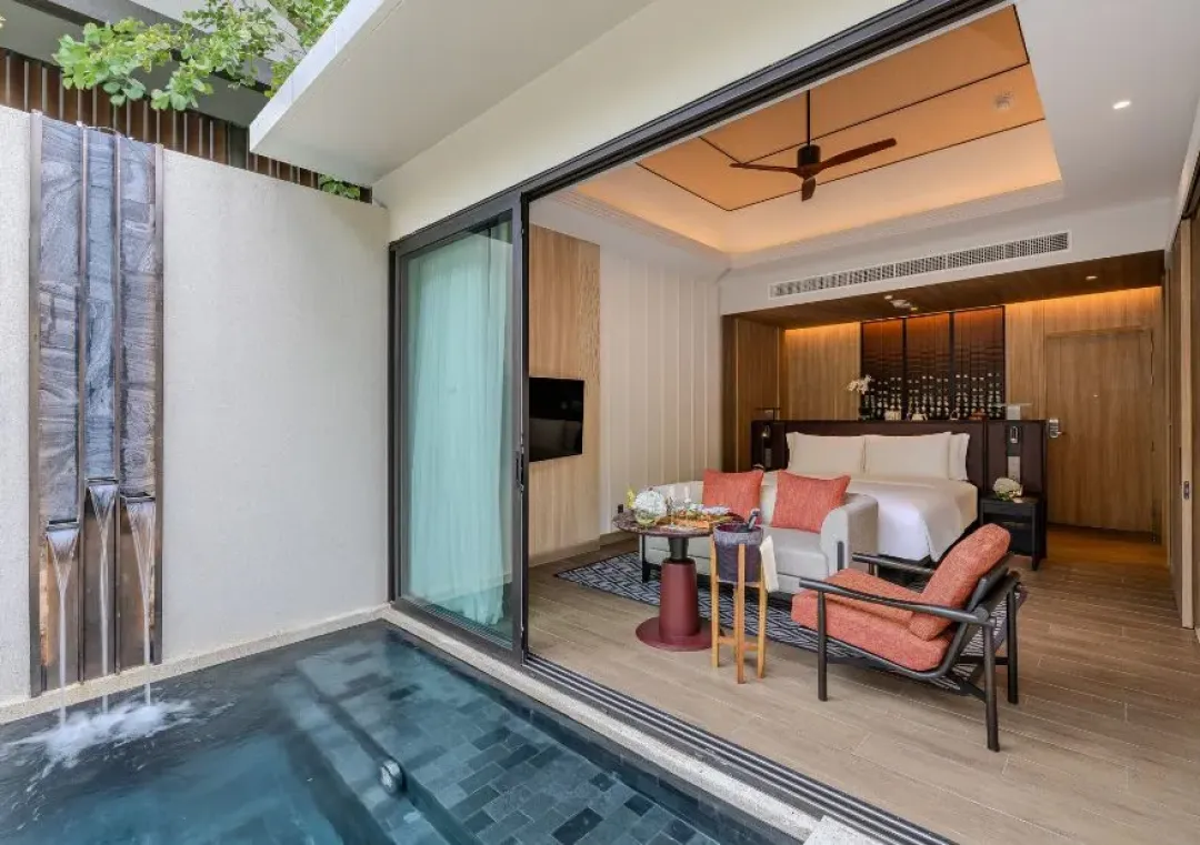 Deluxe Pool Villa - Bedroom with Seating Aeria