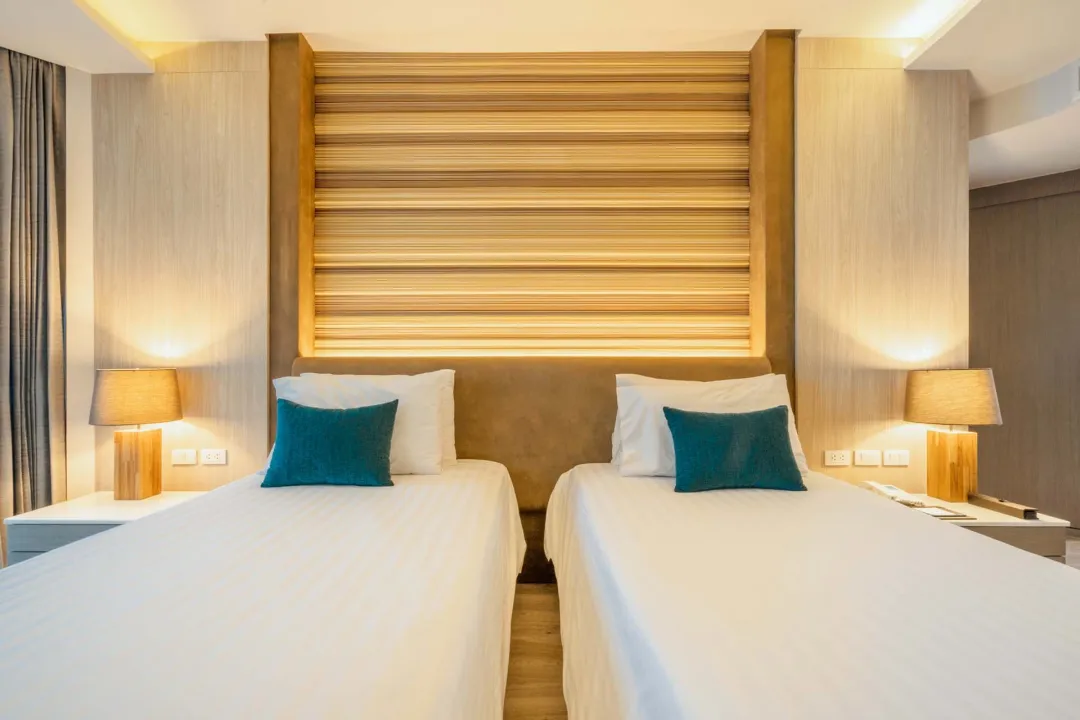 Deluxe Corner Room - Bedroom