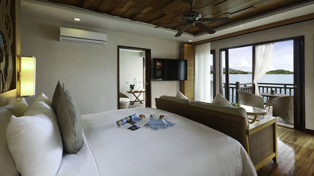 Premier Suite on Water - Bedroom with Sea View