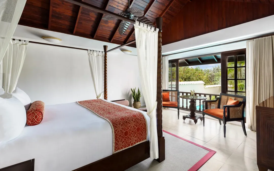 Spice-Island-Beach-Resort-Luxury-Almond-Suite-King-Bed