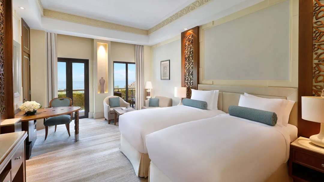Al-Bustan-Palace-Deluxe-Sea-View-Twin-Beds