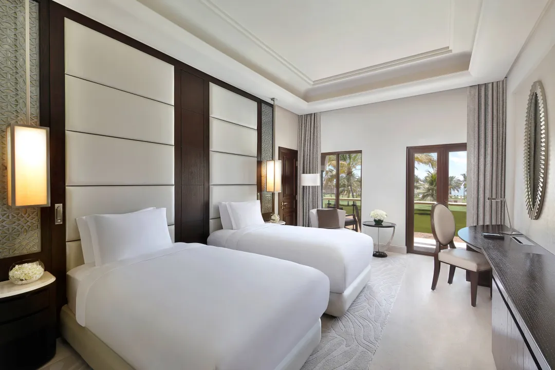Al-Bustan-Palace-Deluxe-Garden-View-Twin-Bed