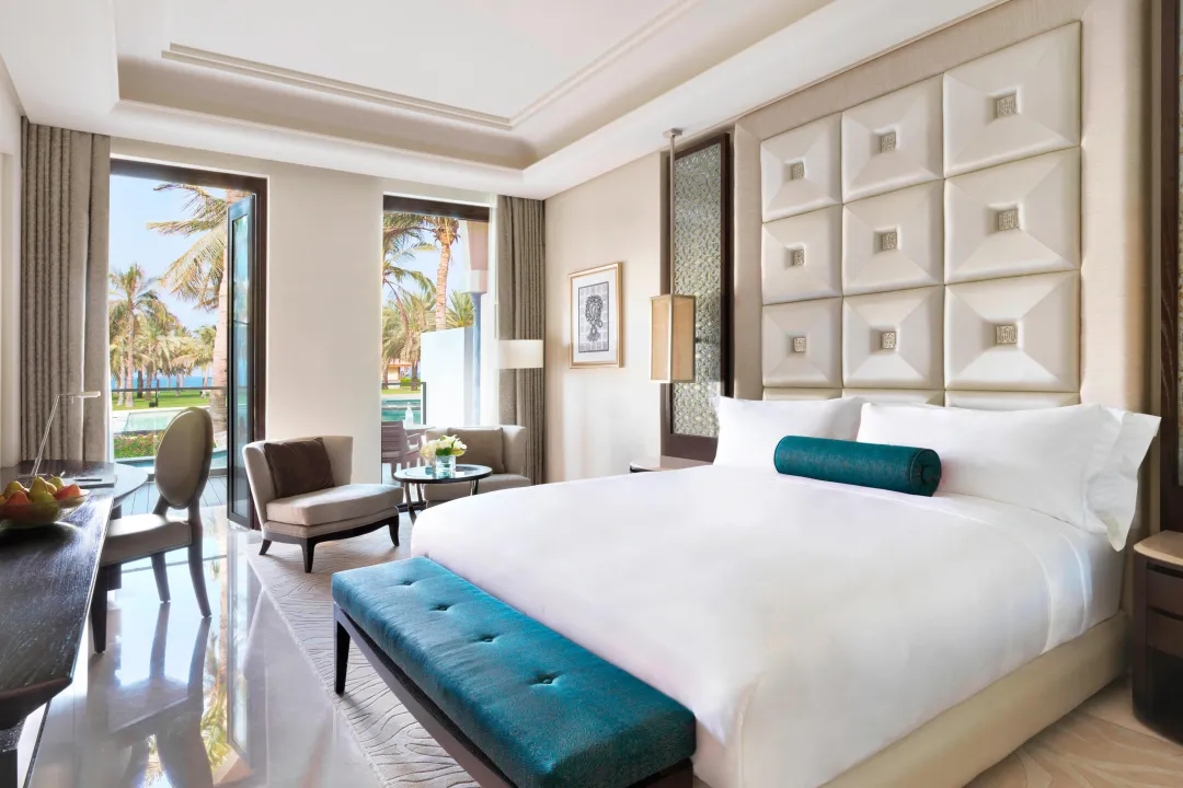 Al-Bustan-Palace-Deluxe-Lagoon-Access-King-Bed
