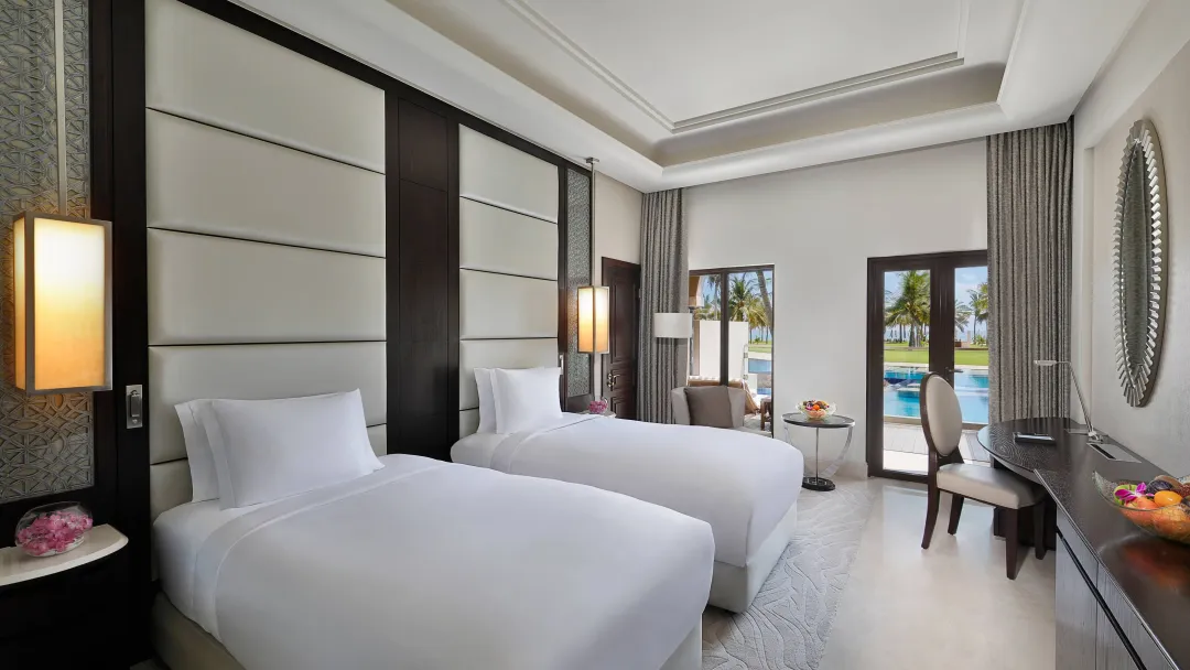 Al-Bustan-Palace-Deluxe-Lagoon-Access-Twin-Beds