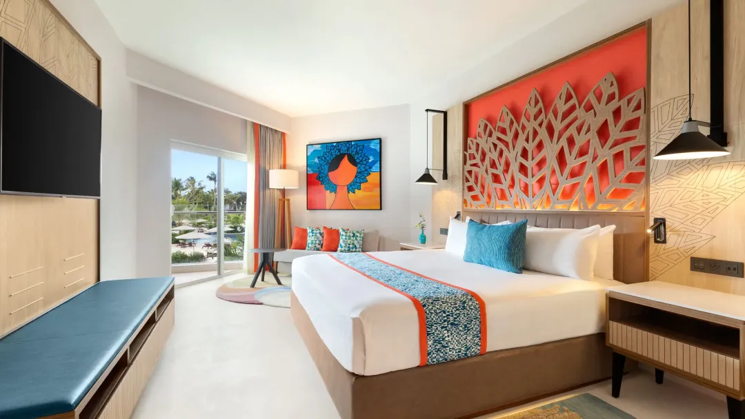 Odysseys Travel - Dreams La Romana Resort and Spa - Deluxe Partial Ocean View King - Bedroom View