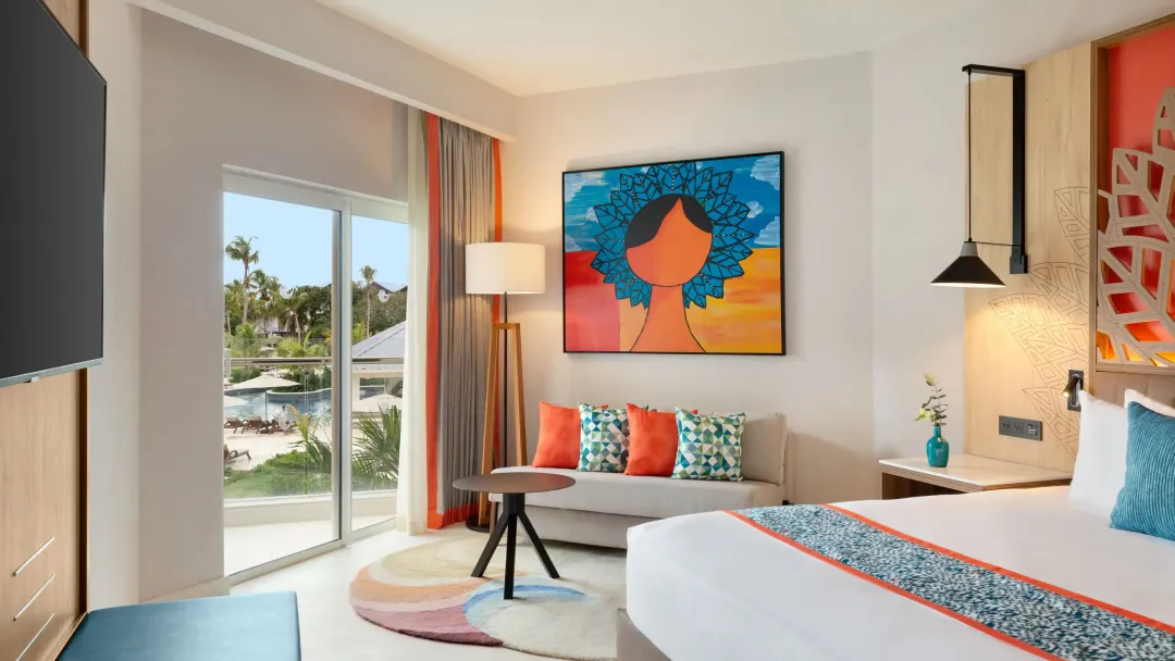Odysseys Travel - Dreams La Romana Resort and Spa - Deluxe Partial Ocean View King - Seating Area