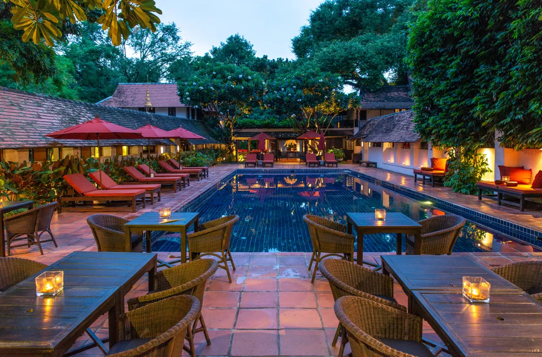 Tamarind Village Chiang Mai - Pool at dusk