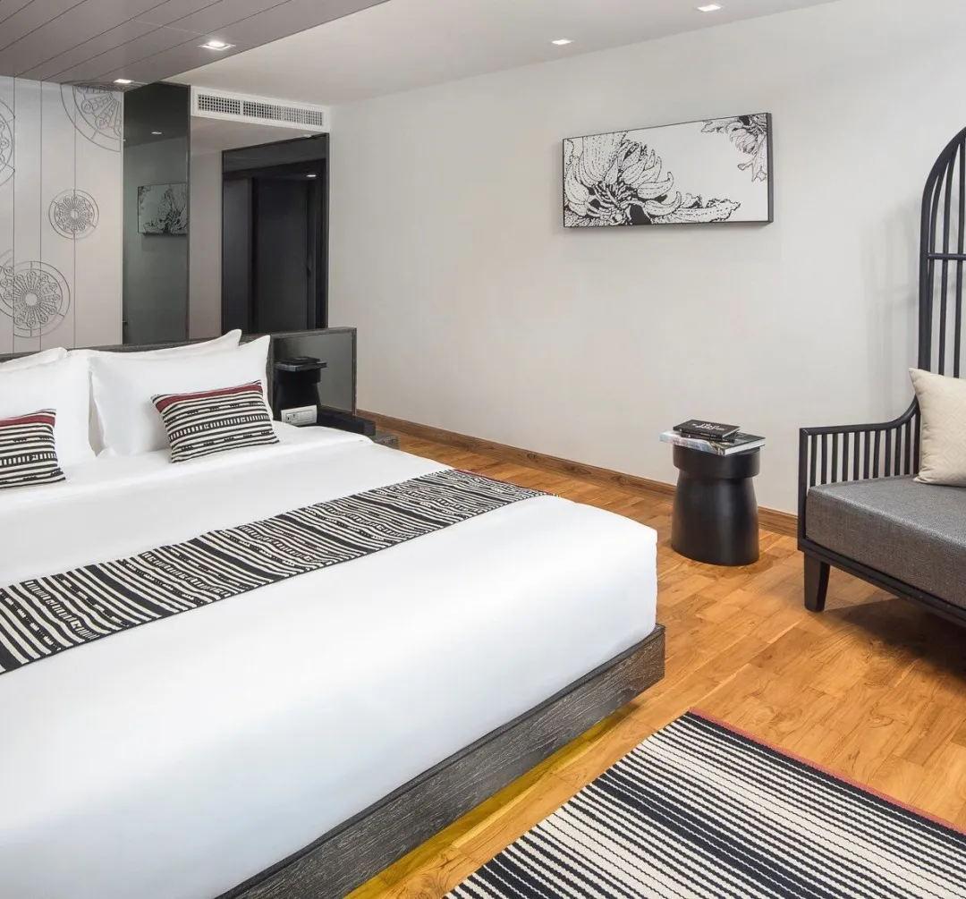 Cross-Chiang-Mai-Riverside-Garden-View-Suite-King-Bed