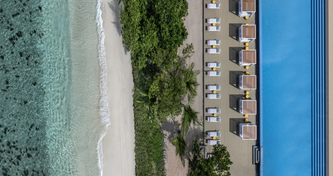 Avani_Plus_Barbarons_Seychelles_ZIL_Pool_Aerial_Beachview