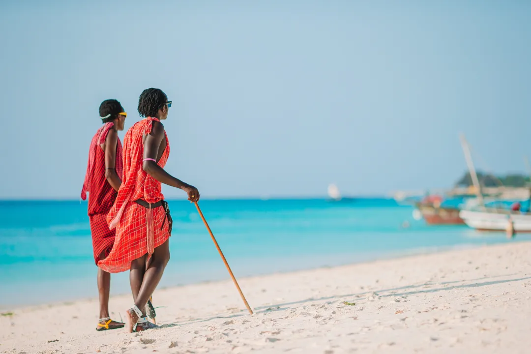 Two Masai Dressed in Traditional Clothes