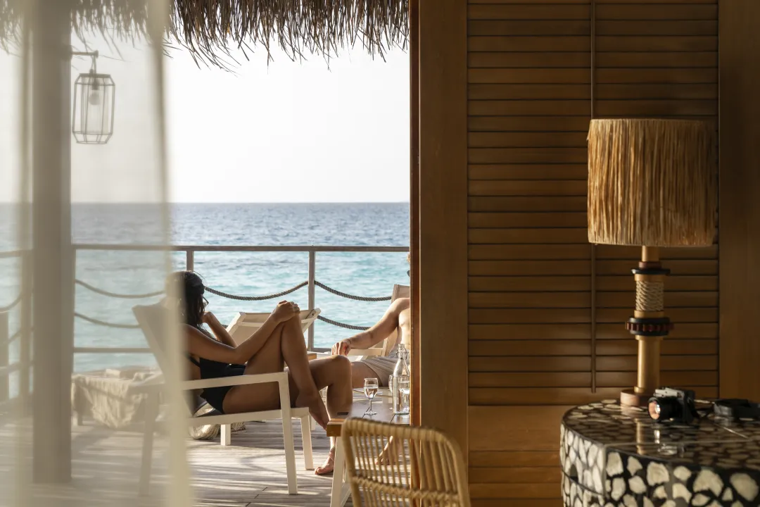 Constance Moofushi - Couple by the deck