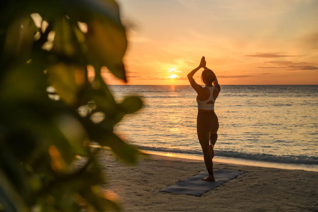 Conrad Maldives Rangali Island - Sunset Yoga on the Beach