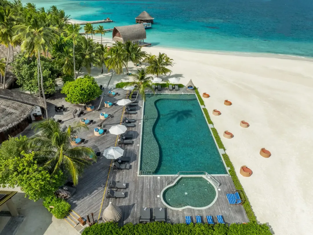 Angsana-Velavaru-Main-Pool-Aerial-View