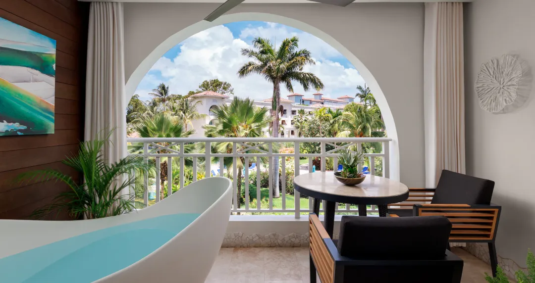 Crystal Lagoon One Bedroom Butler Honeymoon Luxury Suite with Balcony Tranquility Soaking Tub - 1B - Balcony Lounge
