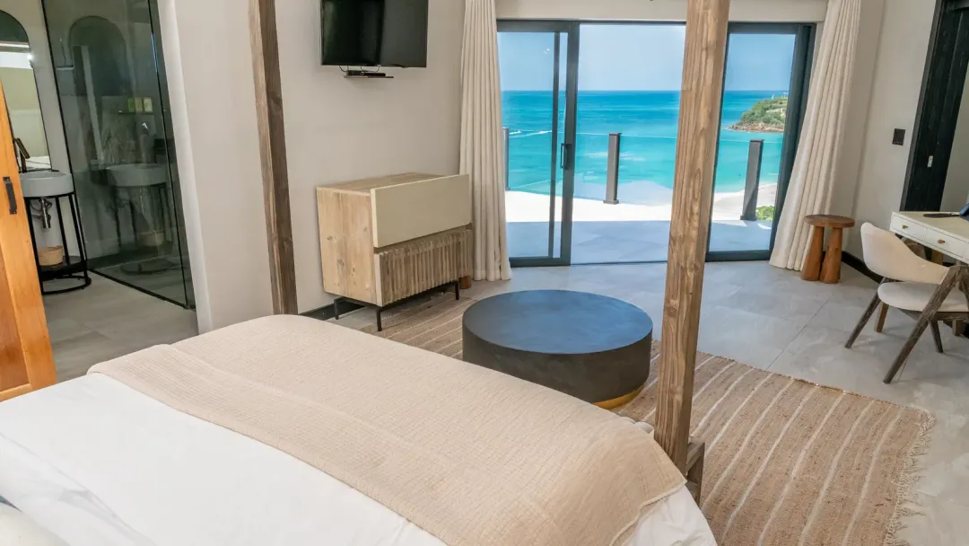Tamarind-Hills-Antigua-Two-Bedroom-Sunset-Vista-with-Pool-View-from-the-bed