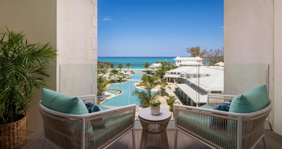 Beaches Turks and Caicos - Treasure Beach Oceanview 2-Bedroom Grand Butler Suite - Balcony Chairs