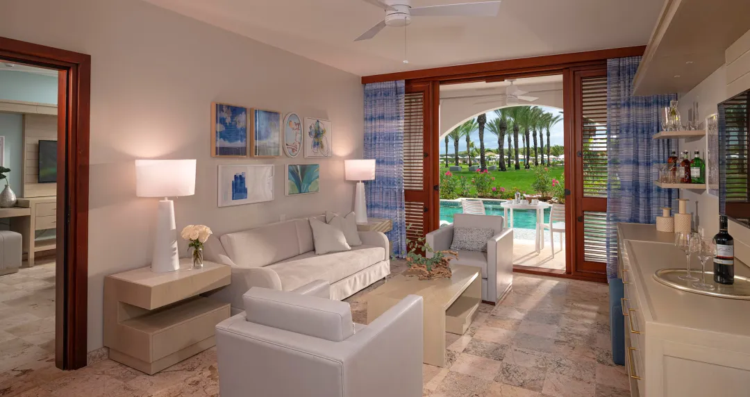 Carisia One Bedroom Swim-up Butler Suite with Patio Tranquility Soaking Tub - Living Room