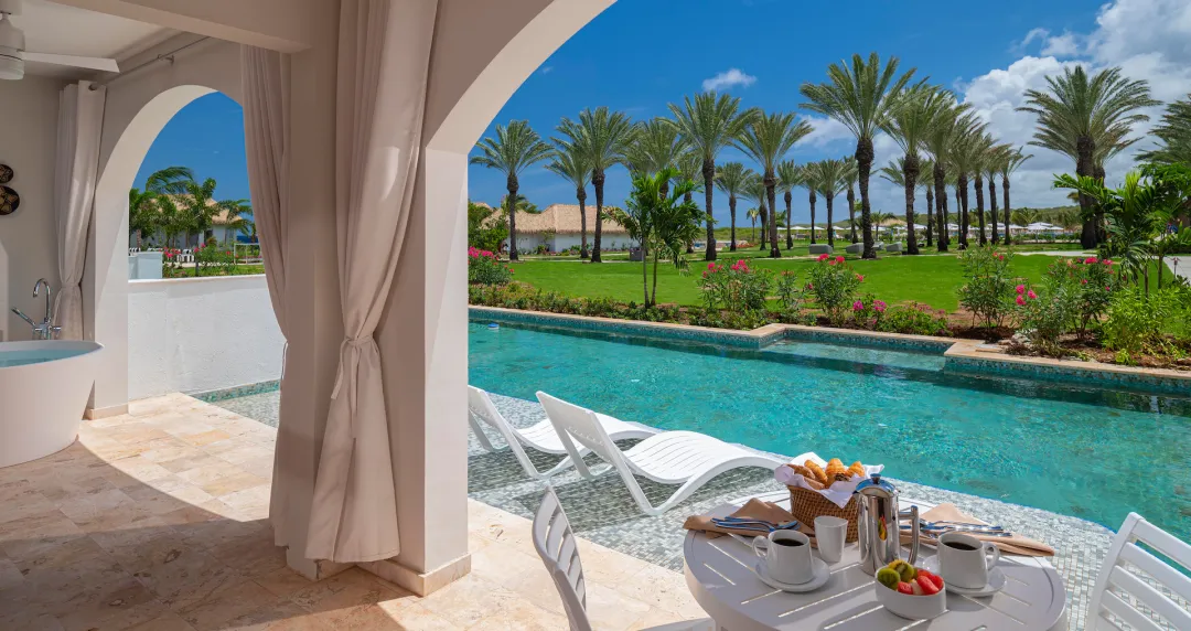 Carisia One Bedroom Swim-up Butler Suite with Patio Tranquility Soaking Tub - Pool Lounge with View