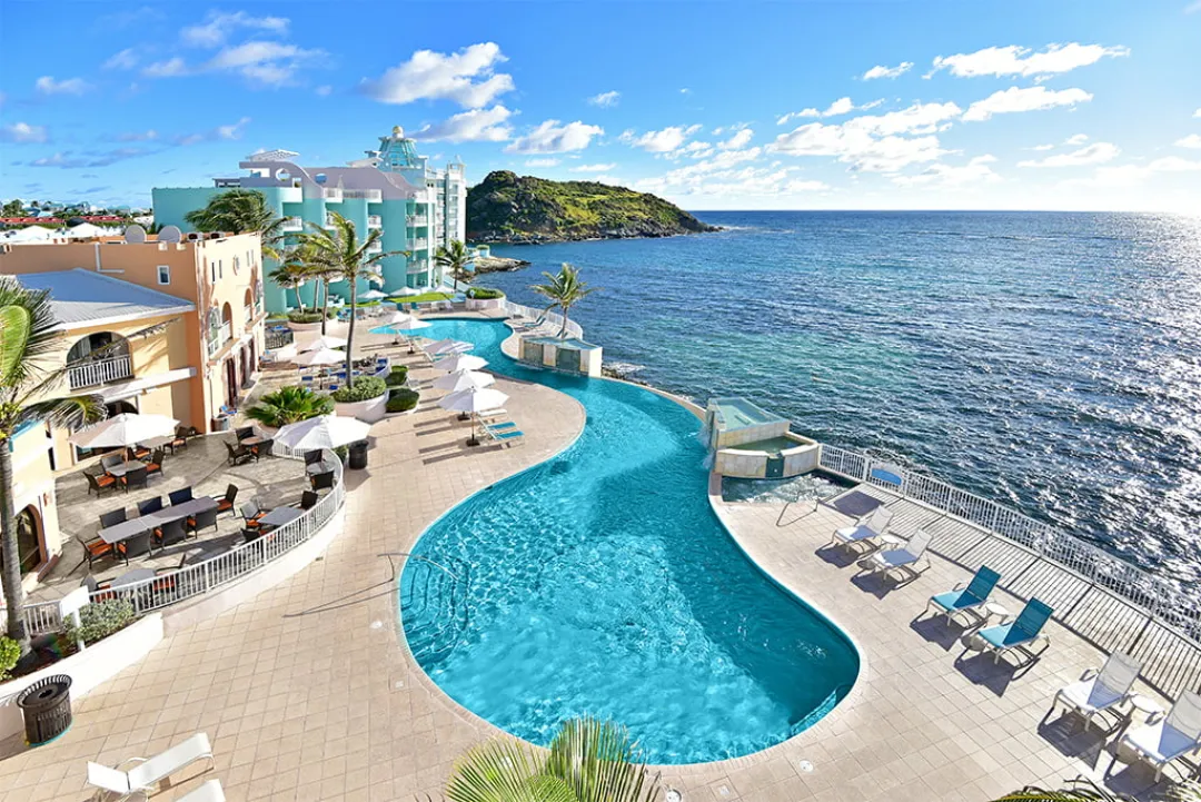 Odysseys Travel - Oyster Bay Beach Resort - Pool Aerial View