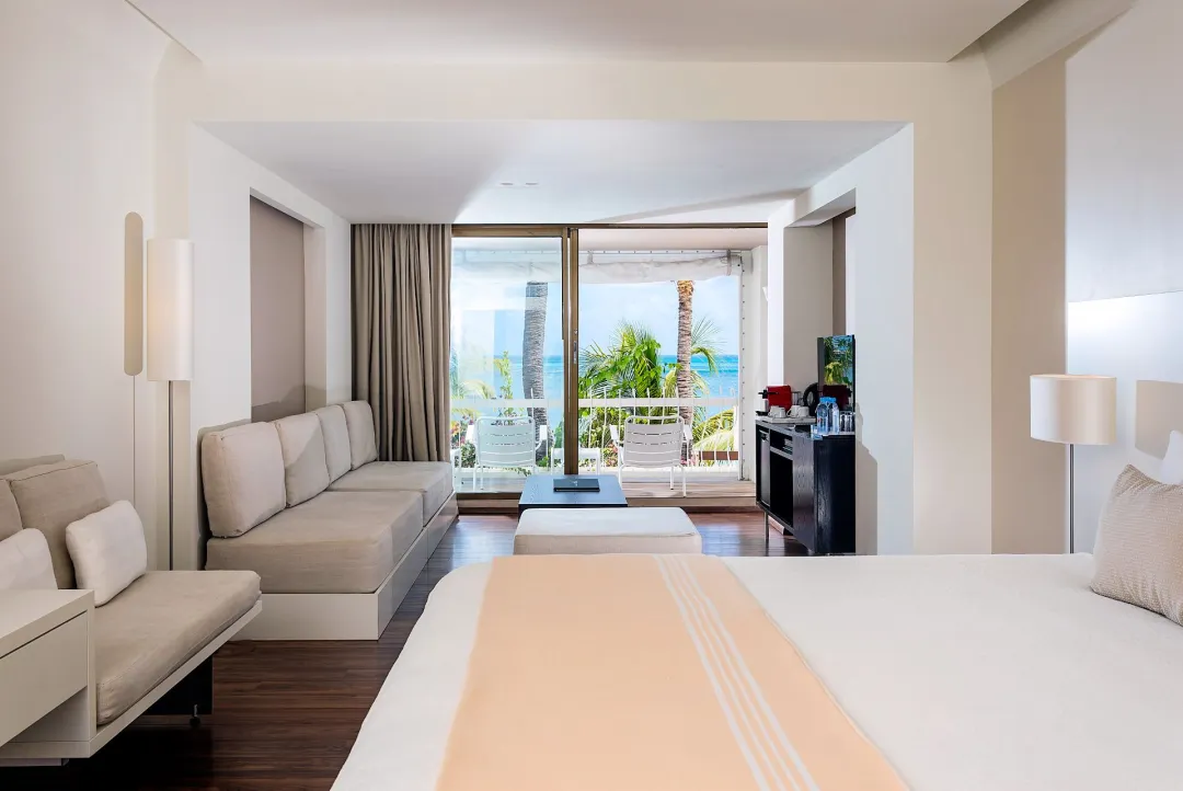Odysseys Travel - Holland Beach House Hotel - Junior Suite - Bedroom With Sea View