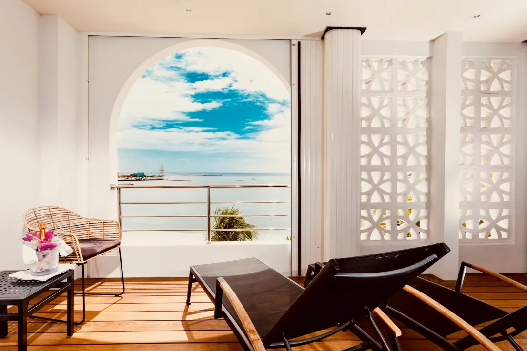 Odysseys Travel - Holland Beach House Hotel - Royal Suite - Balcony Lounge