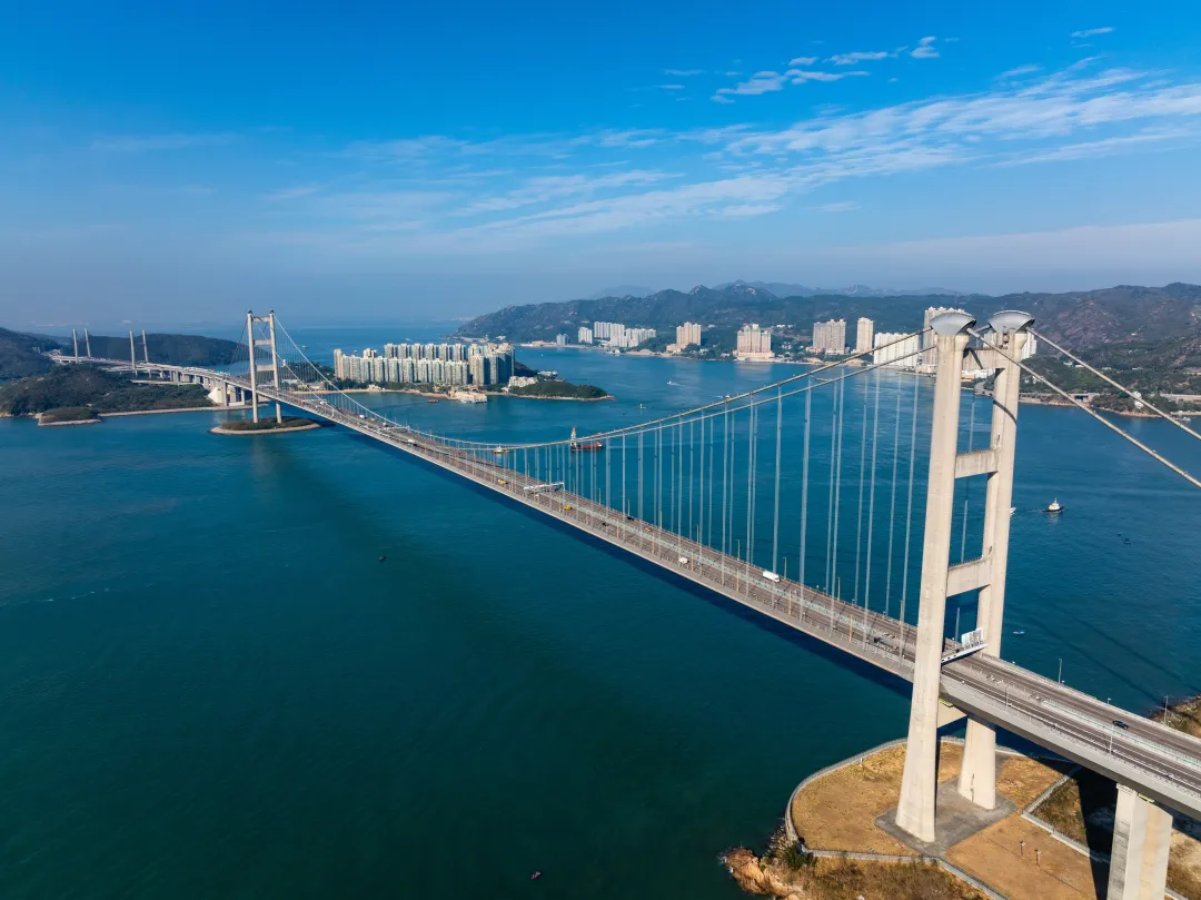 Odysseys Travel - Aerial view of massive Tsing Ma suspension bridge in Hong Kong city
