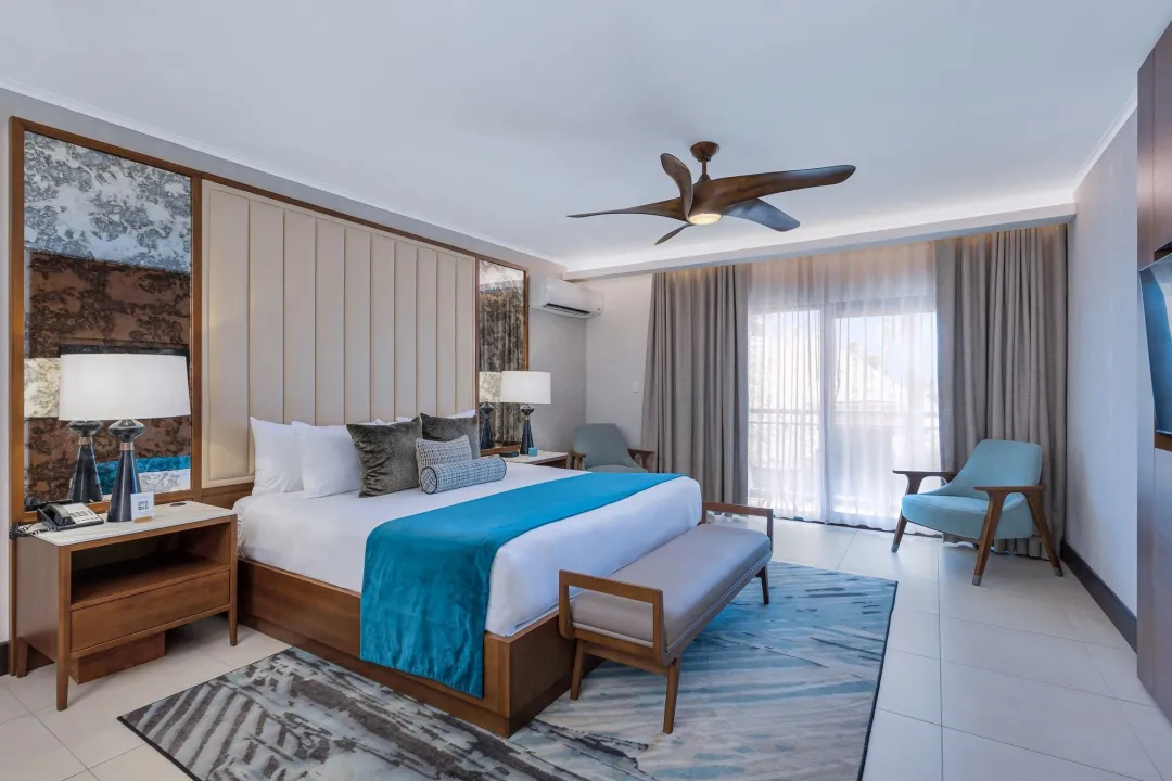 Odysseys-Travel-Manchebo-Beach-Resort-and-Spa-Deluxe-One-Bedroom-Suite-King-Bed