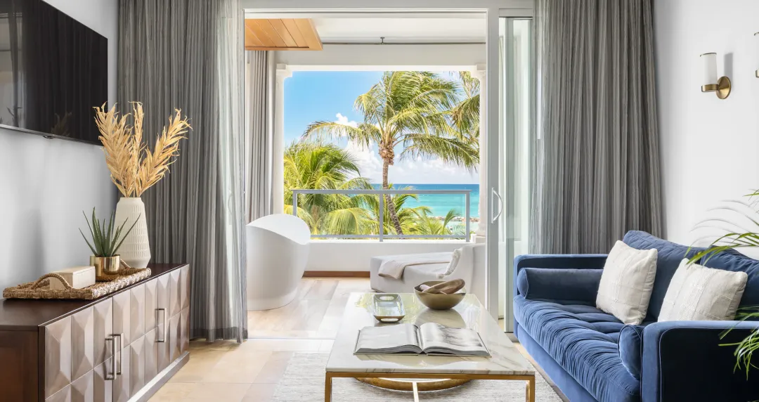 Beachfront One Bedroom Skypool Butler Suite with Balcony Tranquility Soaking Tub - Seating Aeria