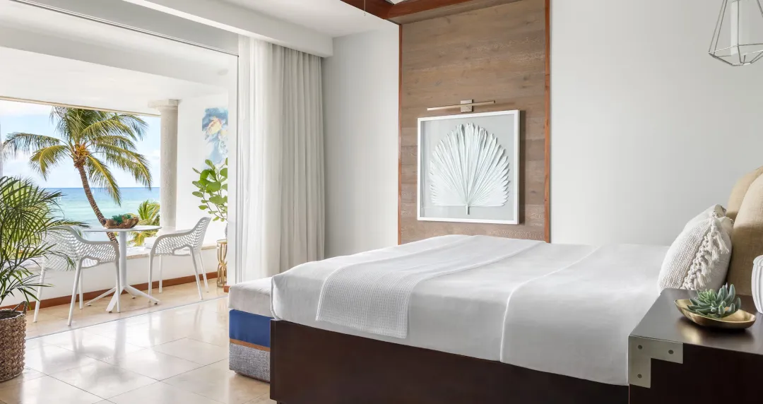 Beachfront One Bedroom Skypool Butler Suite with Balcony Tranquility Soaking Tub - Bedroom