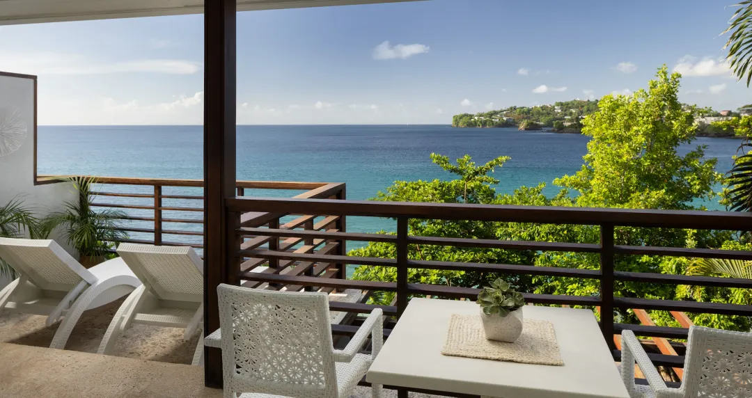 Oceanfront Two-Story One Bedroom Butler Villa Suite with Balcony Tranquility Soaking Tub - Balcony Lounge View