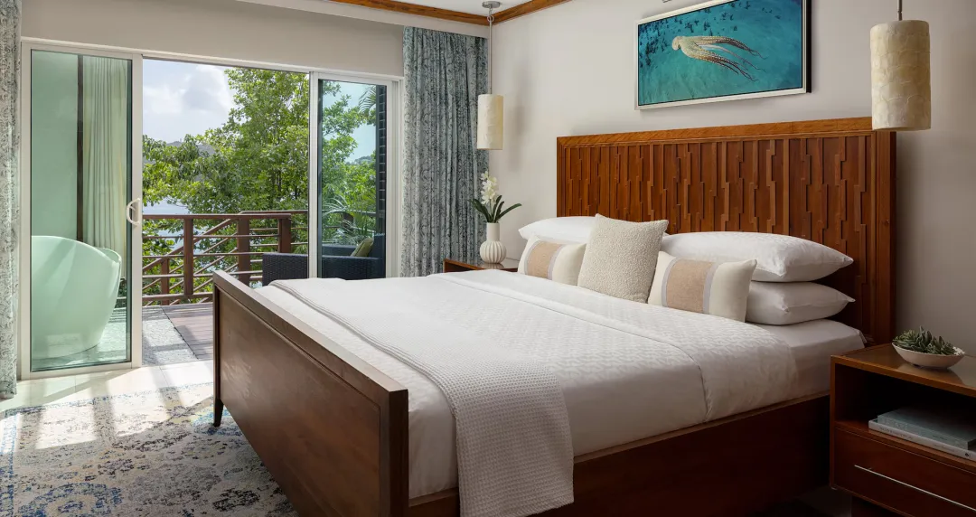 Oceanfront Two-Story One Bedroom Butler Villa Suite with Balcony Tranquility Soaking Tub - Bedroom
