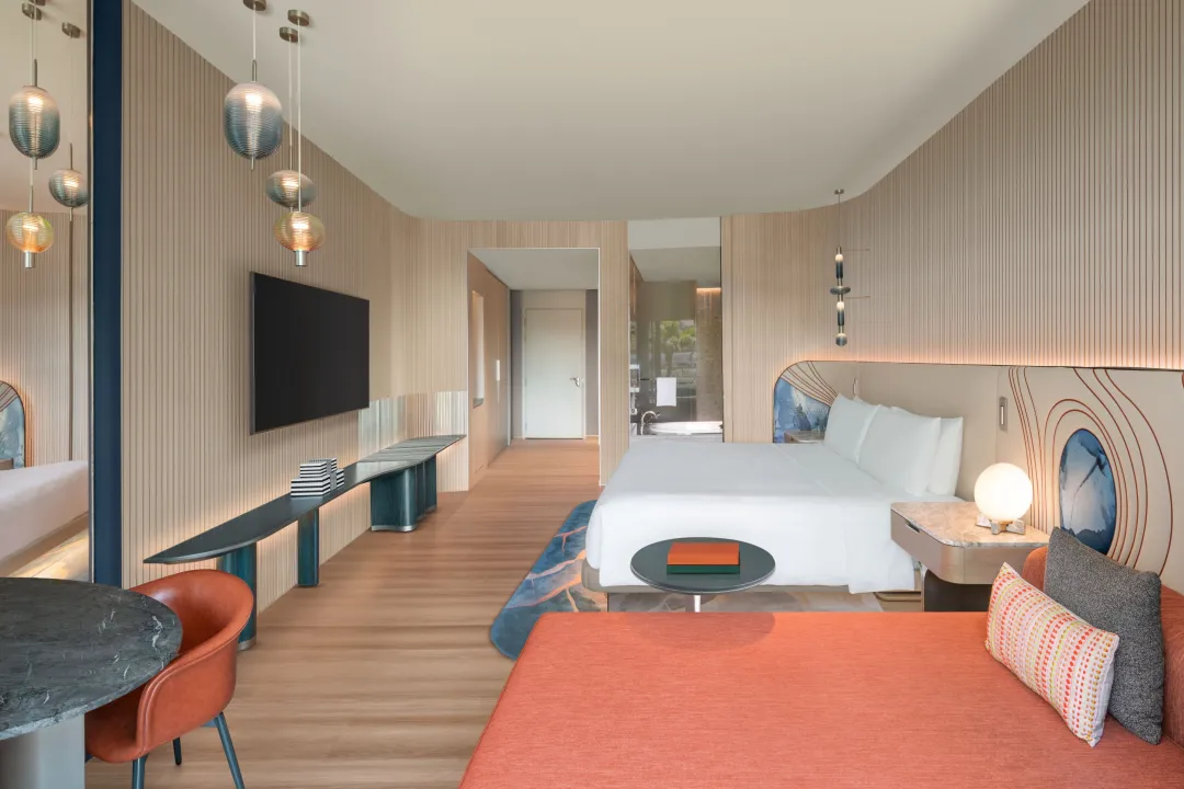 Odysseys Travel - W Singapore Sentosa Cove - Deluxe Room - Bedroom Seating Area