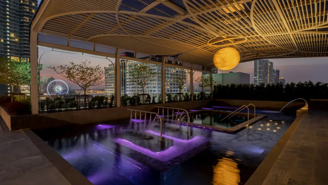 Odysseys Travel - The Salil Hotel Riverside Bangkok - Rooftop Aquatherapy Pool at Night