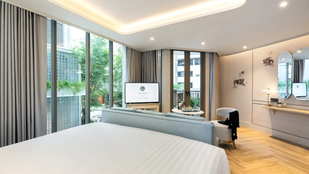 Odysseys Travel - The Salil Hotel Riverside Bangkok - Grand Deluxe Balcony - Bedroom