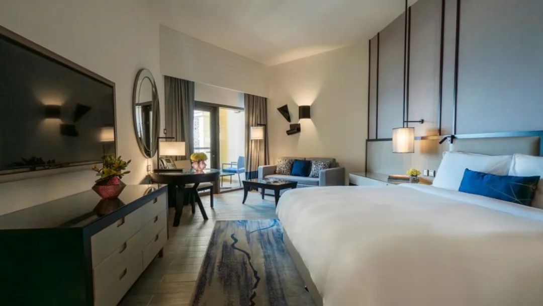 Odysseys Travel - Amwaj Rotana - Rooms - Sea View Room with Balcony - Bedroom