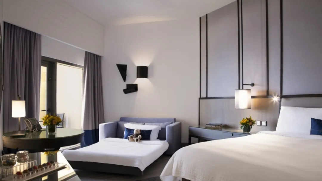 Odysseys Travel - Amwaj Rotana - Rooms - Sea View Family Room with Balcony - Bedroom